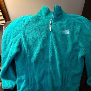 Medium North Face zipper jacket.